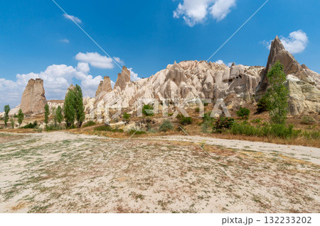 Volcanic rock formations landscape in Cappadocia, place of residence of ancient Christians Volcanic rock formations landscape in Cappadocia, place of residence of ancient Christians 132233202