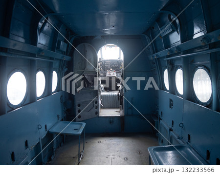 empty aircraft interior, stripped cabin with retro atmosphere, vintage airplane cabin with stripped seats and mood lighting, inside abandoned aircraft with retro style and salvaged lighting empty aircraft interior, stripped cabin with retro atmosphere, vintage airplane cabin with stripped seats and mood lighting, inside abandoned aircraft with retro style and salvaged lighting 132233566