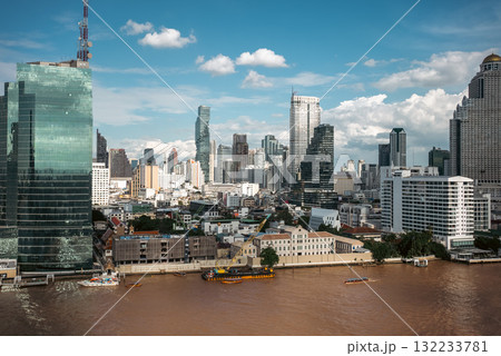 panorama of Bangkok city skyline with tall skyscrapers and Chao Phraya river, scenic cityscape of bustling metropolis and stunning sunset view panorama of Bangkok city skyline with tall skyscrapers and Chao Phraya river, scenic cityscape of bustling metropolis and stunning sunset view 132233781