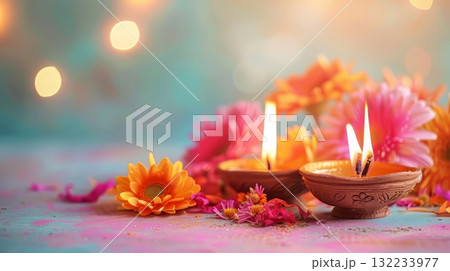 Diya oil lamps and flowers on pink background. Warm and inviting Diwali mood. Copy place Diya oil lamps and flowers on pink background. Warm and inviting Diwali mood. Copy place 132233977