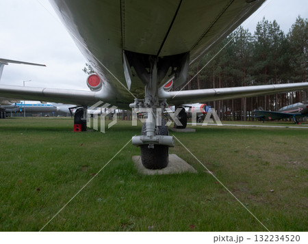 closeup of aircraft landing gear, detailed inspection of landing gear components and assembly, closeup view emphasizing detailed features of aircraft landing gear assembly and inspection 132234520