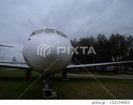 aircraft museum display, vintage plane in museum setting, restored airliner showcases heritage and restoration efforts, museum exhibit features vintage aircraft with weathered metal panels 132234683