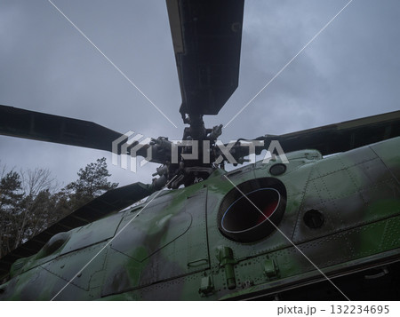 green helicopter rotor with weathered panels, green helicopter rotor hub with rivets and camouflage paint details, weathered helicopter rotor hub with camouflage painted panels 132234695