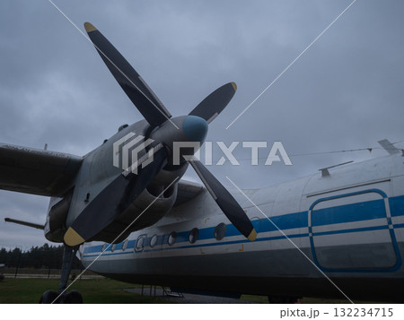 regional aircraft with static display outside, propellerdriven regional aircraft displayed outdoors on grassy field, faded livery regional propeller aircraft on grassy field in overcast regional aircraft with static display outside, propellerdriven regional aircraft displayed outdoors on grassy field, faded livery regional propeller aircraft on grassy field in overcast 132234715