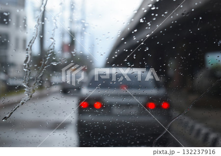 car on highway road with rainny season, blurred image 132237916