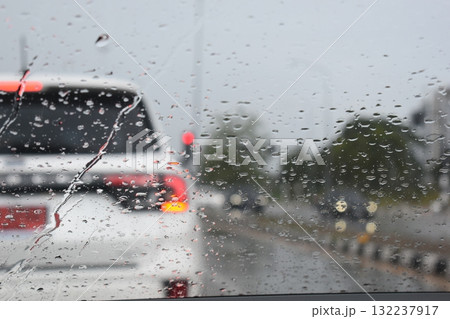 car on highway road with rainny season, blurred image 132237917