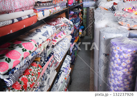 heap of colorful cloth on shelf for sale in store heap of colorful cloth on shelf for sale in store 132237926