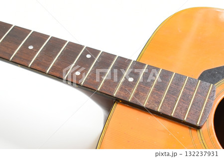brown wood acoustic guitar isolated on white background brown wood acoustic guitar isolated on white background 132237931