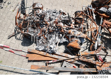 A car is on fire and has been destroyed A car is on fire and has been destroyed 132238504