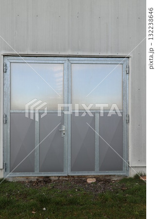 The door is made of glass and metal 132238646