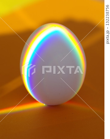 A white egg with rainbow colors on it A white egg with rainbow colors on it 132238756