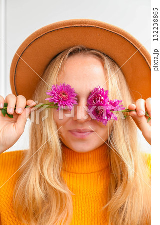 Woman close her eyes with pink chrysanthemum Autumn garden colorful flowers. Beautiful autumnal bouquet dahlia chrysanthemum. Red pink orange fall color fall floral background. Flower shop and florist Woman close her eyes with pink chrysanthemum Autumn garden colorful flowers. Beautiful autumnal bouquet dahlia chrysanthemum. Red pink orange fall color fall floral background. Flower shop and florist 132238865