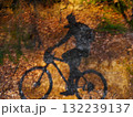 Man riding a bike in the woods 132239137