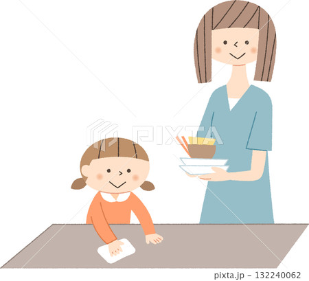 食後の片付けをする親子 132240062