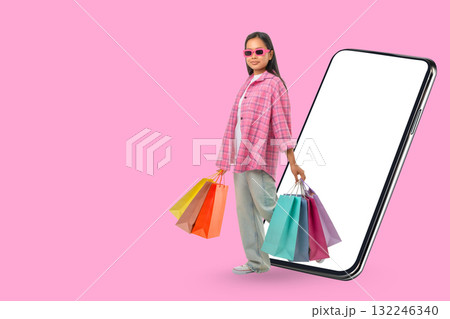 Young girl celebrates Black Friday with vibrant shopping bags Young girl celebrates Black Friday with vibrant shopping bags 132246340