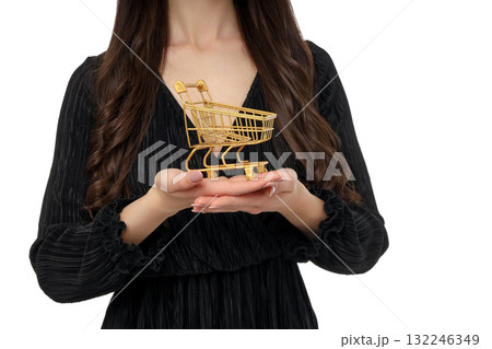 Woman with dark hair showcasing a golden shopping cart, isolated, PNG Woman with dark hair showcasing a golden shopping cart, isolated, PNG 132246349