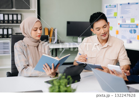 Business team discuss at meeting room. working together with laptop ,tablet and smart phone on desk Financial accountant at office 132247628