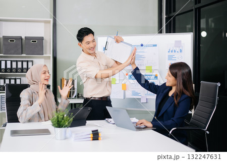 Business team discuss at meeting room. working together with laptop ,tablet and smart phone on desk Financial accountant at office Business team discuss at meeting room. working together with laptop ,tablet and smart phone on desk Financial accountant at office 132247631