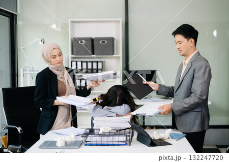 Furious Asian businesspeople arguing strongly after making a mistake at work in office Furious Asian businesspeople arguing strongly after making a mistake at work in office 132247720