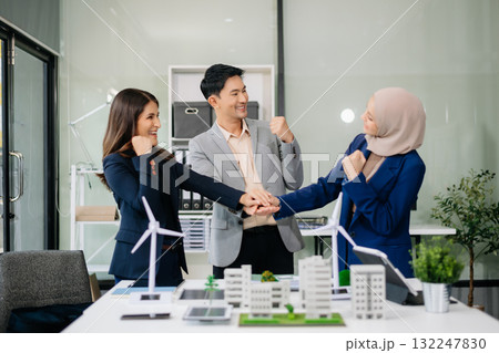 business team people planning and discussing on recycle reduce reuse policy symbol in office meeting room. Green business company and Solar Energy. 132247830