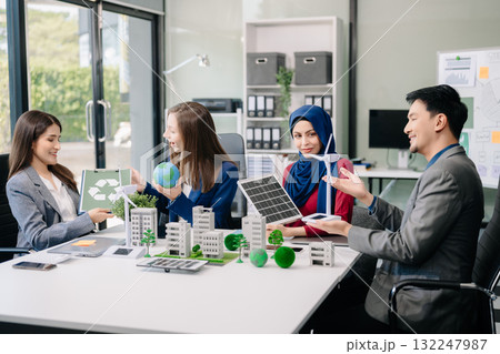 business team people planning and discussing on recycle reduce reuse policy symbol in office meeting room. Green business company and Solar Energy Environment city 132247987