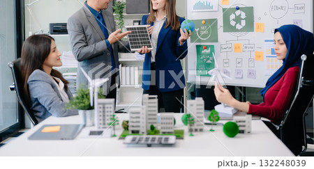Group of alternative energy engineers discussing a project with a worker businesspeople a meeting in solar cell panel and Solar Energy Environment city Group of alternative energy engineers discussing a project with a worker businesspeople a meeting in solar cell panel and Solar Energy Environment city 132248039