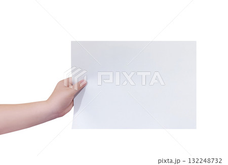 Hand holding a blank white sheet of paper. 132248732