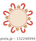 Circular Christmas frame made of red candy canes and star cookies, festive holiday decoration 132248994