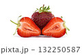 Fresh strawberries are presented whole and sliced, perfect for a healthy treat. 132250587