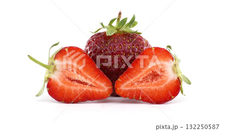 Fresh strawberries are presented whole and sliced, perfect for a healthy treat. Fresh strawberries are presented whole and sliced, perfect for a healthy treat. 132250587