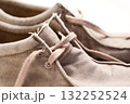 Old worn fabric shoes with laces close up 132252524