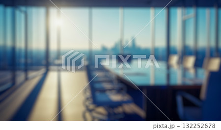 Blurry modern conference room with sunset city view for executive business meeting, corporate negotiation, or strategic planning session background concept 132252678