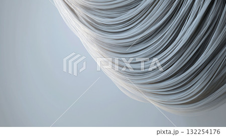Closeup of flowing silvery strands creating abstract wave-like texture on a light blue background Closeup of flowing silvery strands creating abstract wave-like texture on a light blue background 132254176
