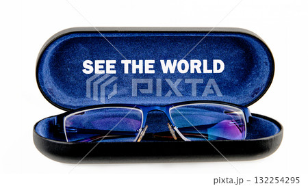 Glasses rest in an elegant case, inviting you to explore and embrace the world. The words See the World inspire a journey filled with wonder and new perspectives 132254295