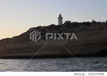 Alfanzina Lighthouse on Algarve Cliffs at Dusk 132254566