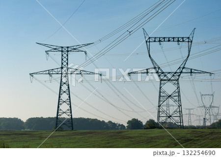 Electricity pylon and nature, real life photo 132254690