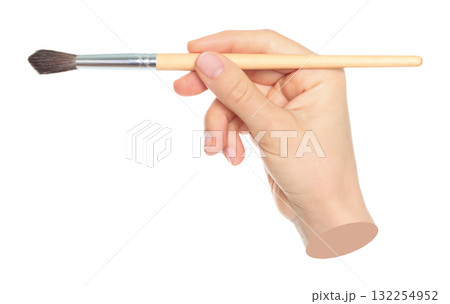 Woman hand holds paint brush, isolated on transparent background, painting and design concept. Contemporary art 132254952