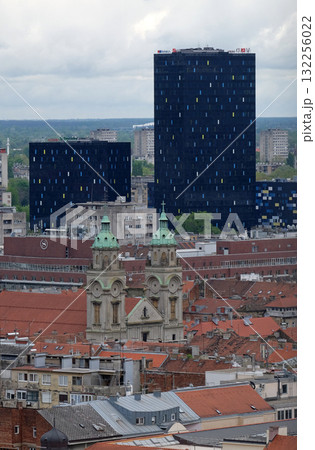 Basilica of the Sacred Heart of Jesus and the new metal and glass buildings in the center of Zagreb, Croatia Basilica of the Sacred Heart of Jesus and the new metal and glass buildings in the center of Zagreb, Croatia 132256022