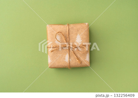 A Christmas gift wrapped in eco-friendly packaging A Christmas gift wrapped in eco-friendly packaging 132256409