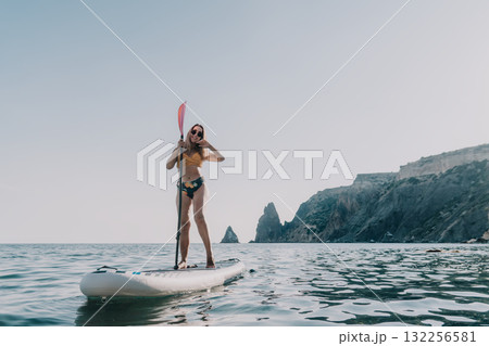Woman Paddleboarding Ocean Coastline Summer 132256581