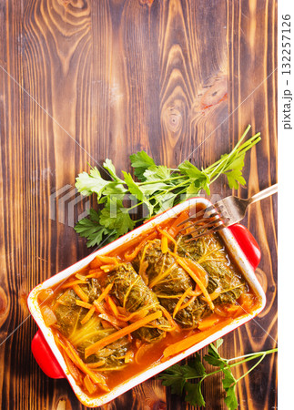 Meatballs with cabbage (golubci) baked in tomato sauce Meatballs with cabbage (golubci) baked in tomato sauce 132257126