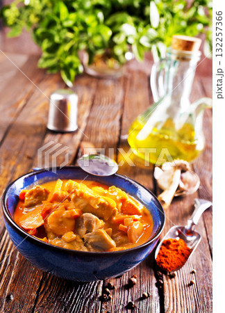 Chicken curry in dark blue bowl 132257366