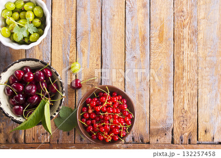 Various fresh berries in a bowls 132257458
