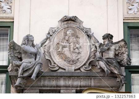 Virgin Mary with baby Jesus, statue on the house facade in Graz, Styria, Austria 132257863
