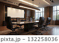 Executive boardroom with a glass table, leather chairs, and high-end pendant lighting. Task lighting focuses on the table, while ambient lighting from recessed 132258036