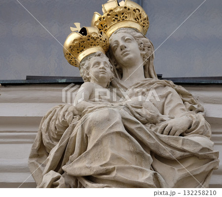 Virgin Mary with baby Jesus on the portal of Mariahilf church in Graz, Styria, Austria 132258210