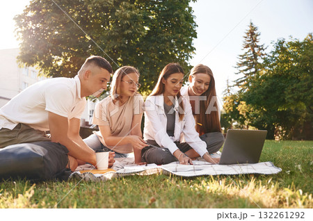 Outside the university. Group of students are together 132261292