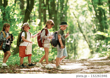 Discovering new place. Kids in forest at summer daytime together 132261946