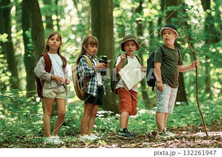 Discovering new place. Kids in forest at summer daytime together 132261947
