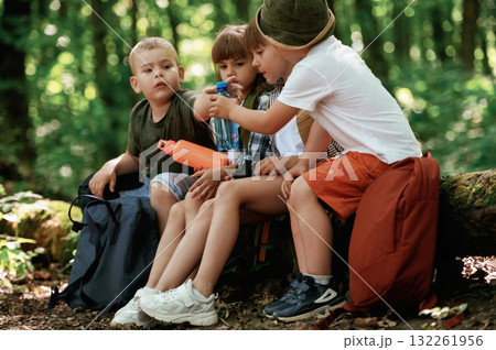 Kids in forest at summer daytime together 132261956